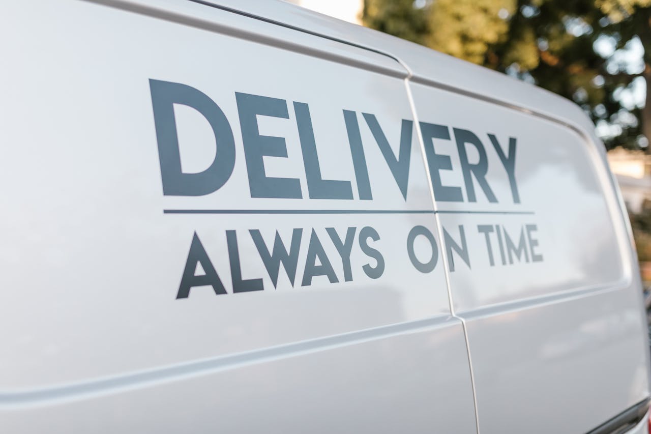 about-01 Close-up of delivery van with slogan 'Always On Time' emphasizing timely service.